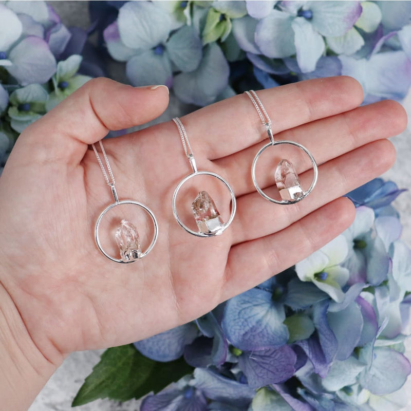 clear-quartz-fixed-point-with-silver-plated-ring-necklace-necklaces-812_8794438b-c363-4a40-b472-96ba5c90d713.jpg