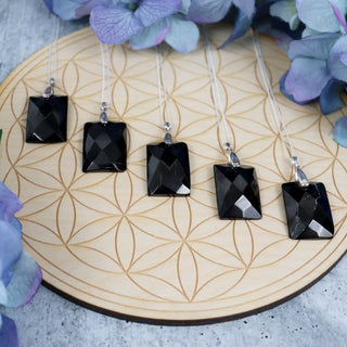 petrovsky-shungite-beveled-rectangle-necklace-necklaces-821_7c8ea7a9-b845-426d-ab6c-c36d80501caa.jpg